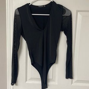 Black bodysuit with sheer sleeves